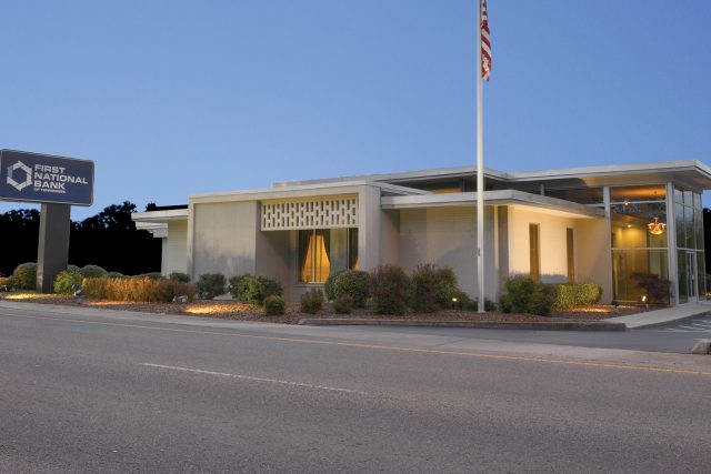 East Main Office building at night time.