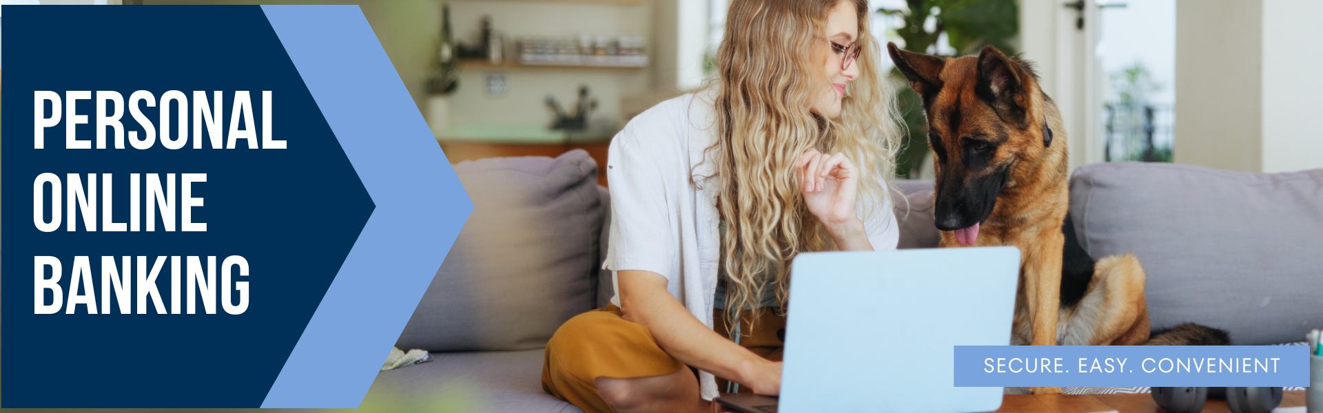Woman sitting on couch checking online banking with German Shepherd dog sitting next to her.