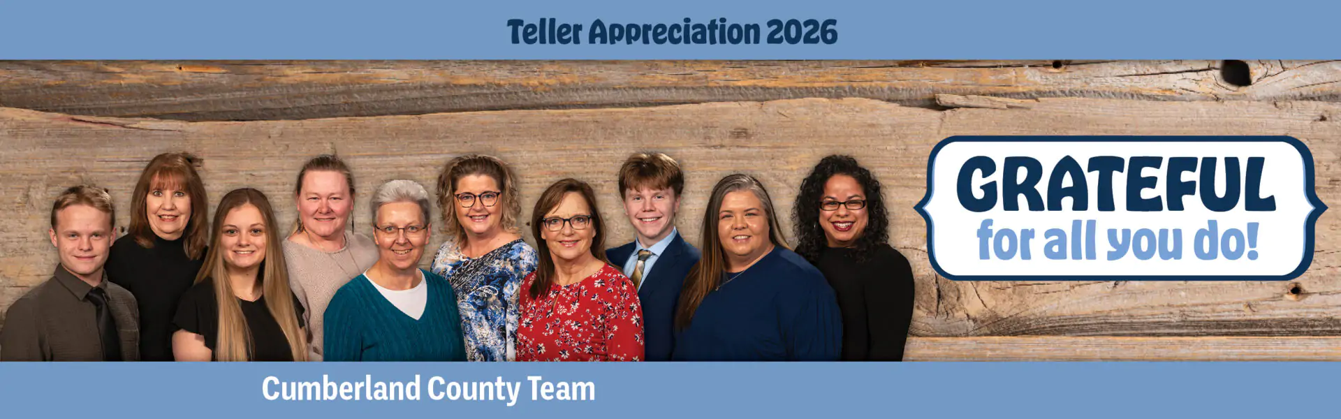 Cumberland County team posing in front of a wood backdrop with a 'Grateful for all you do!' banner for Teller Appreciation 2026.
